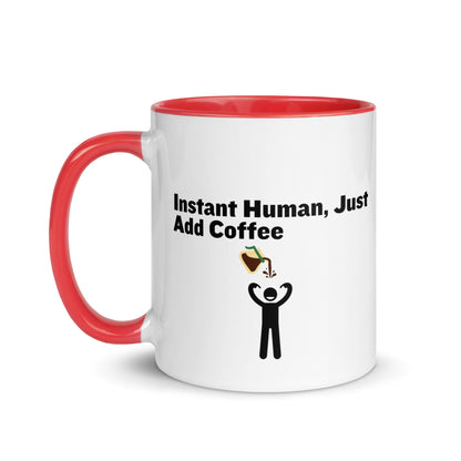 White ceramic mug with red inside and handle with the words "Instant human, just add coffee"