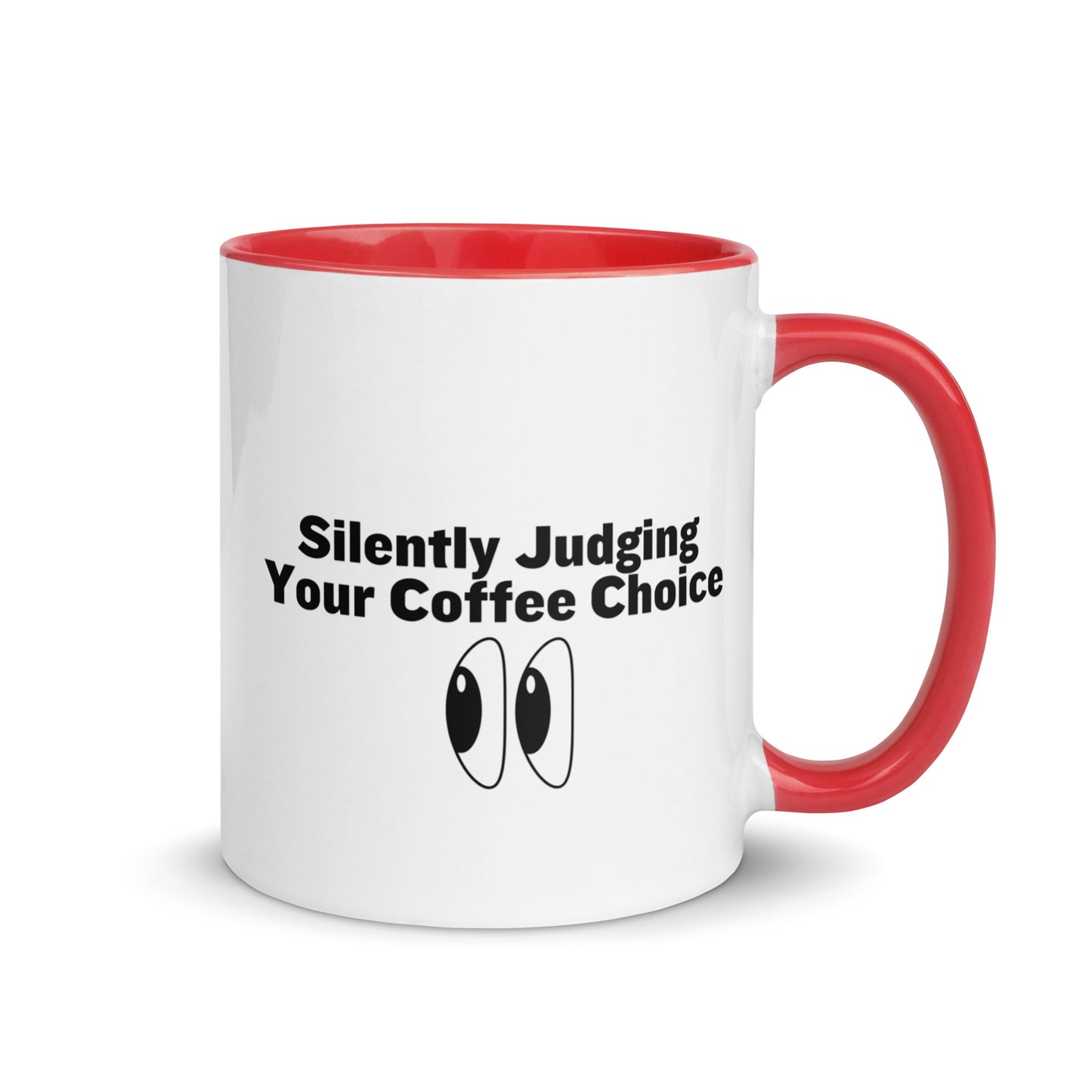 White ceramic mug with red inside and handle with the words, "Silently judging your coffee choice"