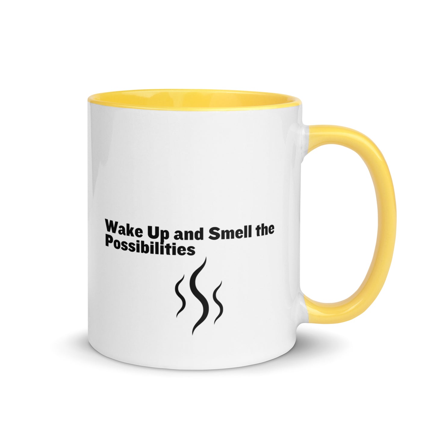 White ceramic mug with yellow inside and handle that says, "wake up and smell the possibilities"