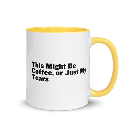 White Ceramic mug with yellow on the inside and handle with the words, "This might be coffee or just my tears"