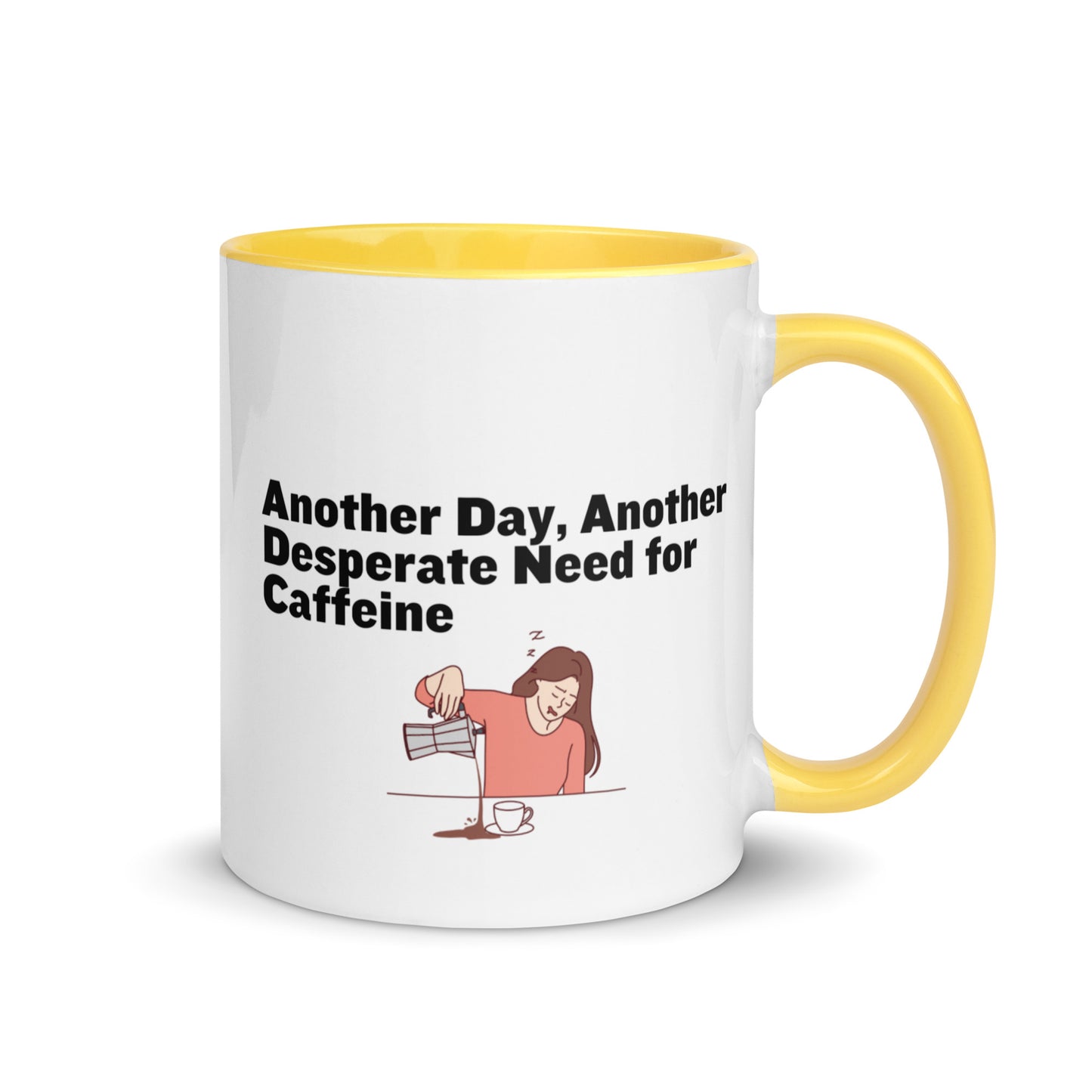 White ceramic coffee mug with yellow inside and handle with the words, "Anotehr day, another desperate need for caffeine" 