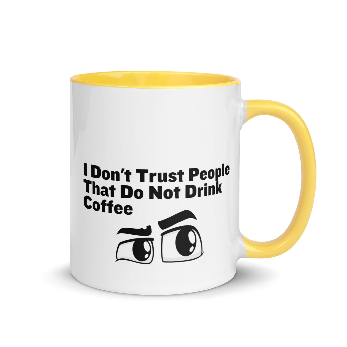 White ceramic mud with yellow on the inside and on the handle with the words, "I don't trust people that do not drink coffee"