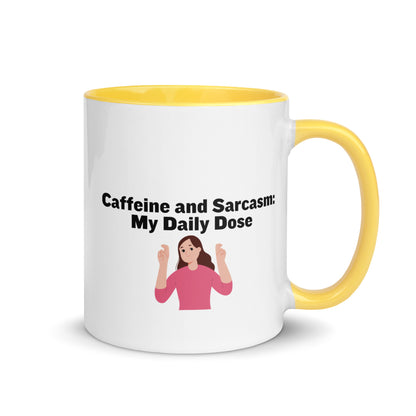 White ceramic mug with yellow on the inside and on the handle with words that say, "Caffeine and Sarcasm: My daily dose"