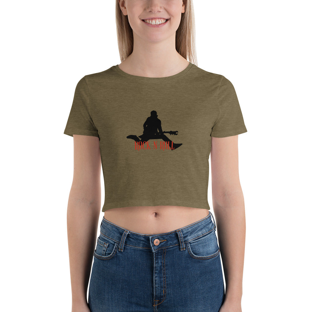 Smiling woman sporting an heathered green crop top featuring a bold "Rock N Roll" slogan and guitarist silhouette.