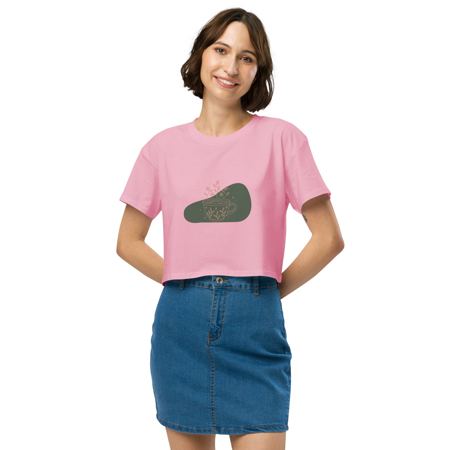 Woman wearing a bubblegum pink loose-fit crop top with a floral coffee cup graphic design, embodying comfortable and authentic fashion by BYOL.