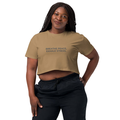 Women’s camel Loose-Fit Crop Top with "Breathe peace, exhale stress" slogan in various colors and sizes, XS to XL.