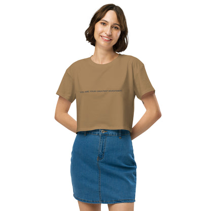 Women’s camel Loose-Fit Crop Top with "You are your greatest investment" slogan in various colors and sizes, XS to XL.