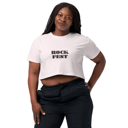 confident woman wearing a white boldness-inspired 'ROCK FEST' crop top