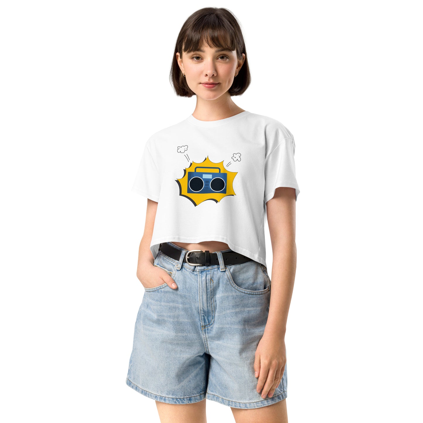 Woman in white crop top featuring a quirky camera graphic with playful accents