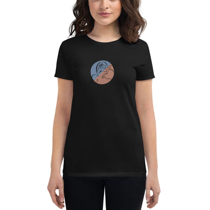 Woman wearing a black fitted tee with an abstract face design, showcasing artistic and comfortable fashion by BYOL.