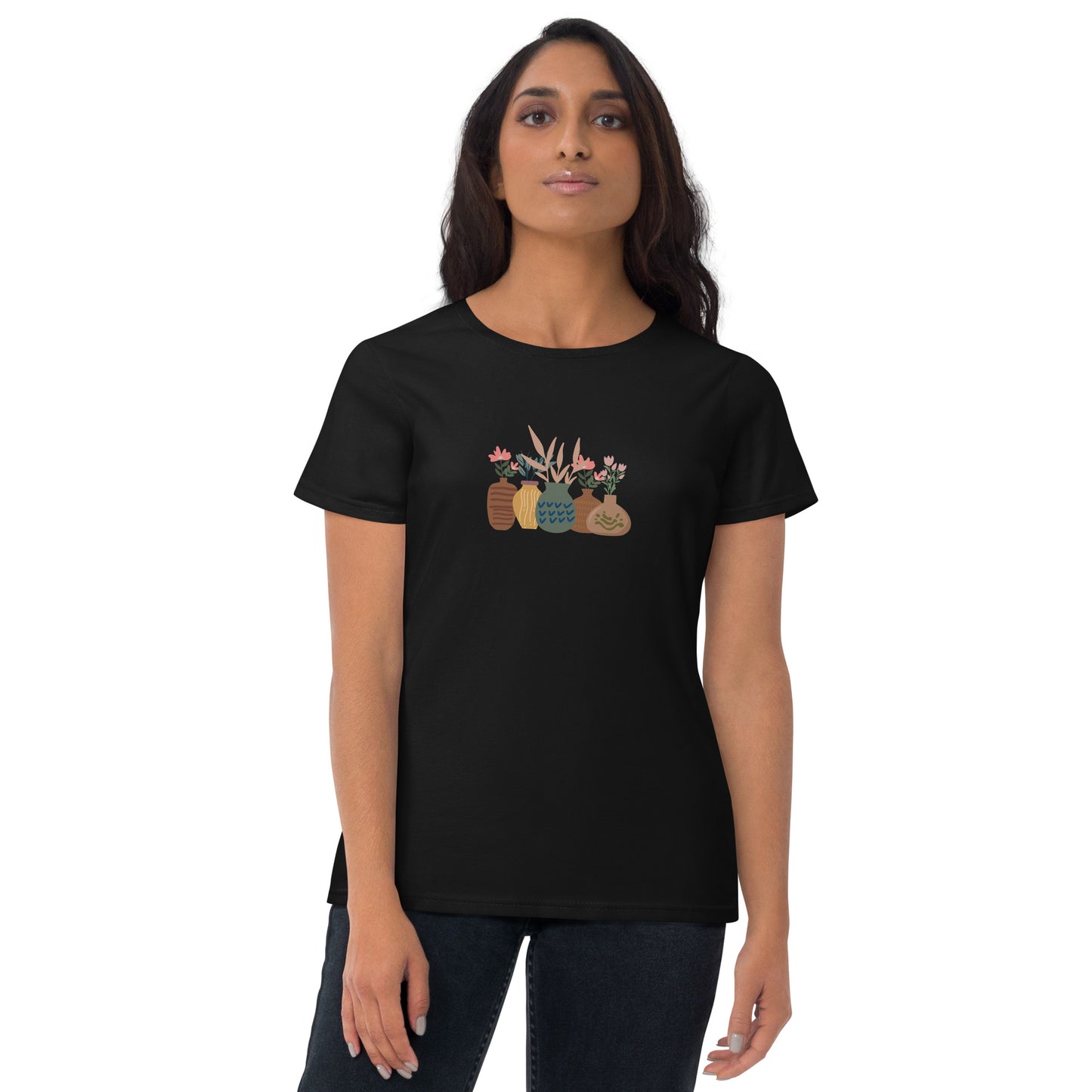 Woman wearing a black fitted tee with a charming potted plants design, embodying subtle self-expression and nature-inspired style by BYOL.