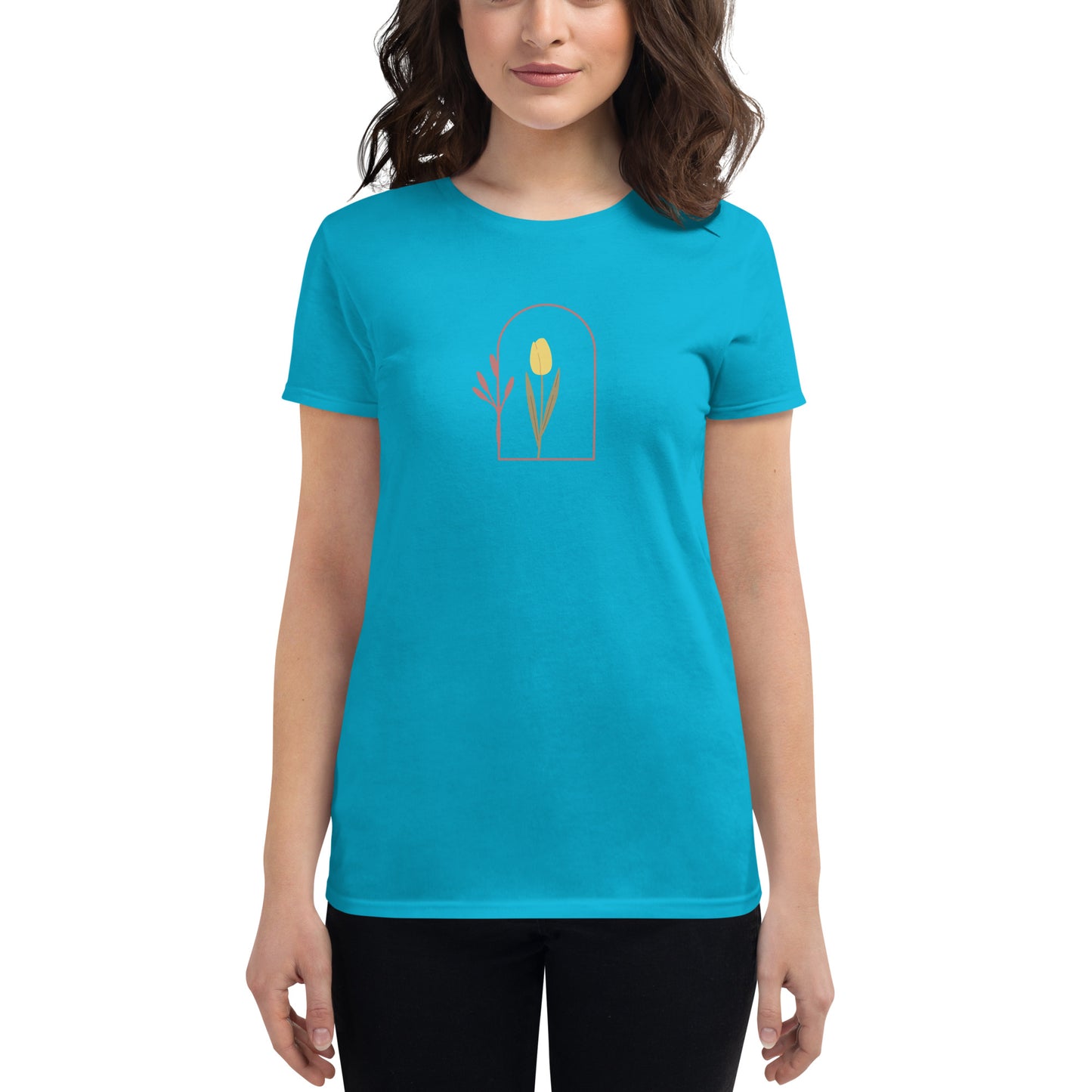 Woman wearing a Caribbean blue fitted tee with a delicate tulip arch design, showcasing subtle elegance and nature-inspired style by BYOL.