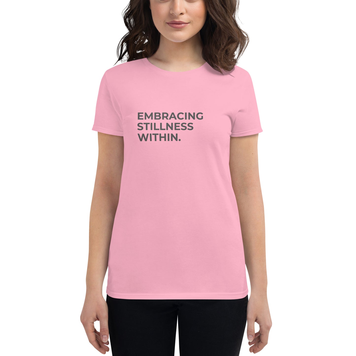 Women’s fitted pink tee with the text "Embracing Stillness Within".