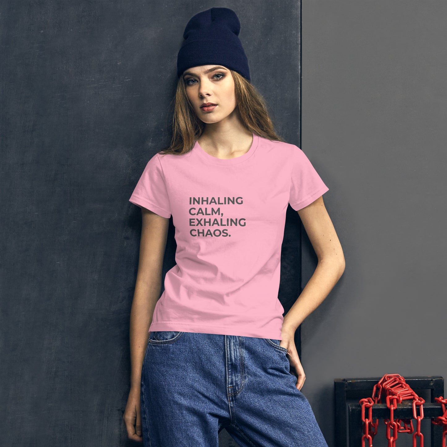 Women’s fitted pink tee with the text "Inhaling Calm, Exhaling Chaos".