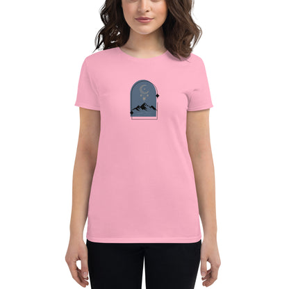 Woman wearing a charity pink fitted tee with a moonlit mountain design, showcasing serene and comfortable fashion by BYOL.