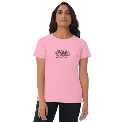 Woman wearing a charity pink fitted tee with a cactus line art design, showcasing minimalistic and comfortable fashion by BYOL.