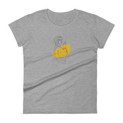 Woman wearing a athletic grey fitted tee with an empowered silhouette design in yellow, showcasing subtle yet impactful self-expression by BYOL.