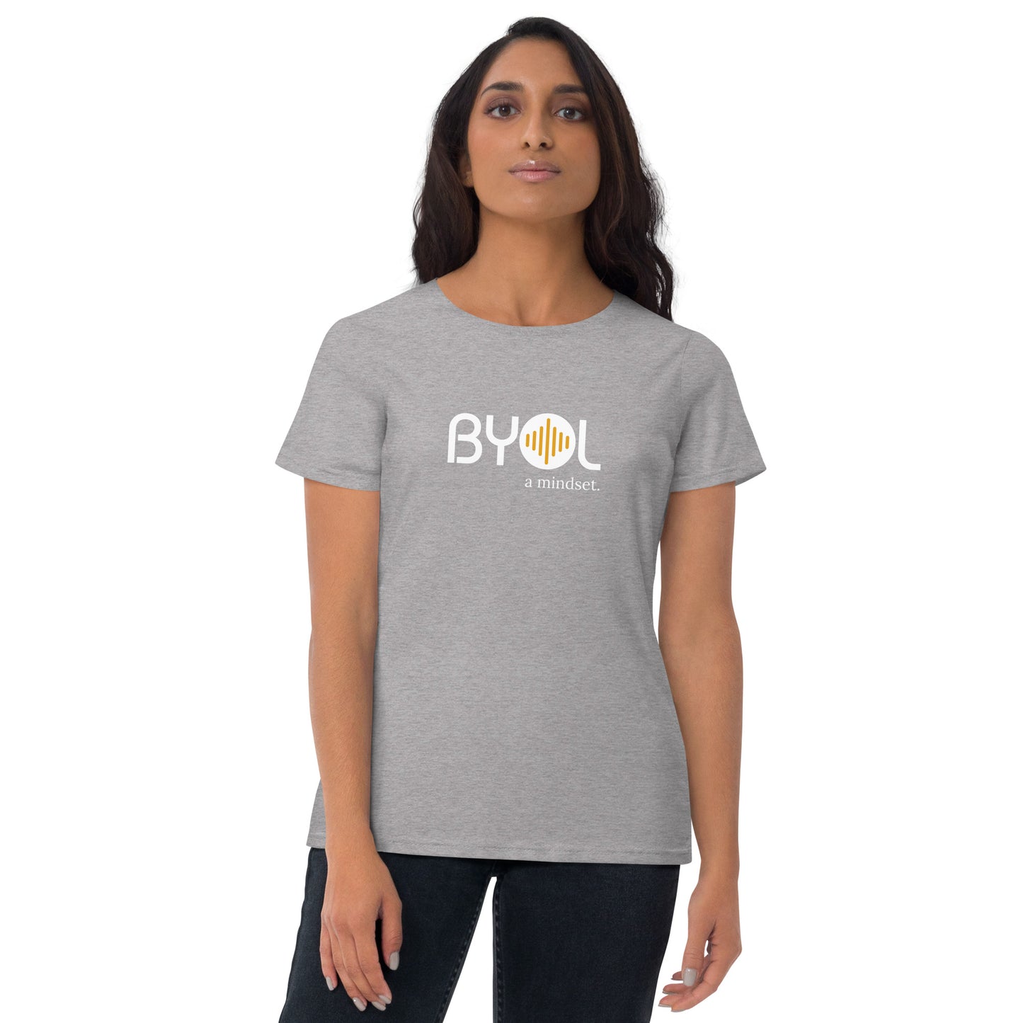 Woman wearing a heather grey BYOL mindset t-shirt with color options in black, red, blue, gray, and white, available in sizes S to 3XL.