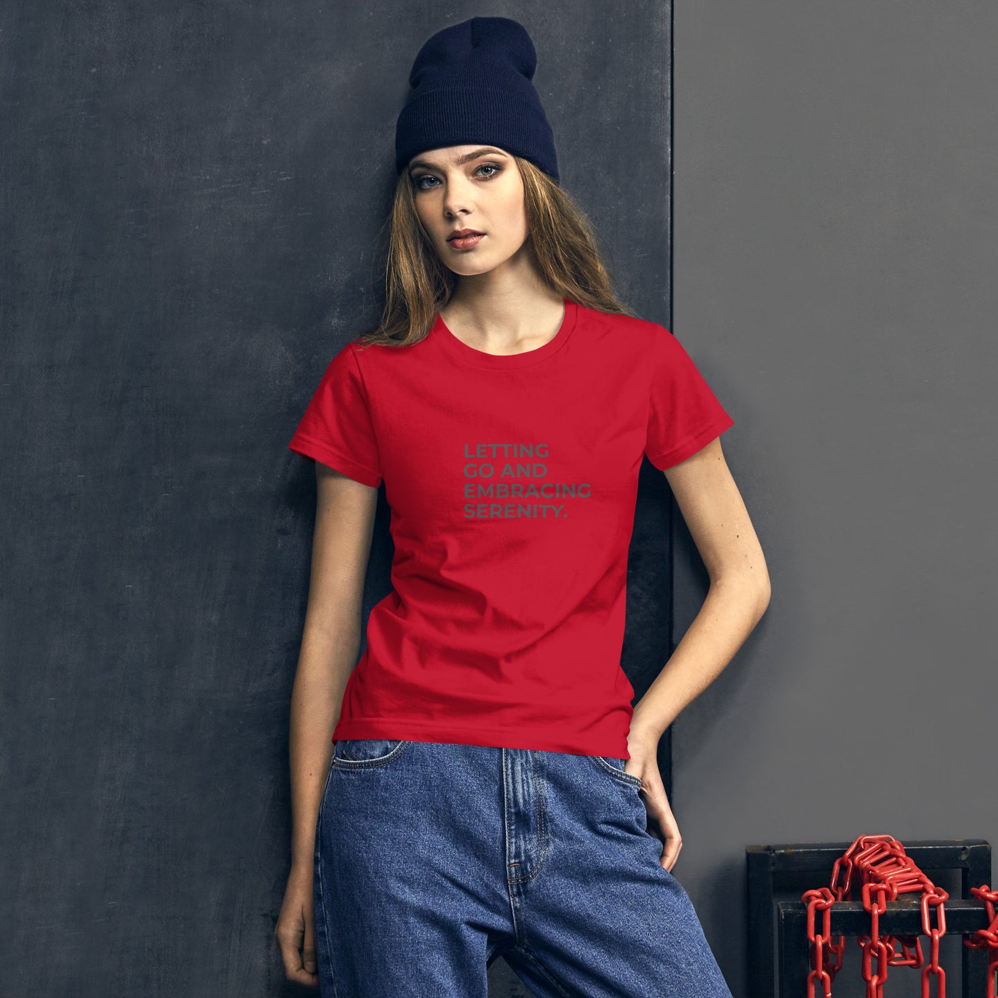 Women’s fitted red tee with the text "Letting Go and Embracing Serenity.