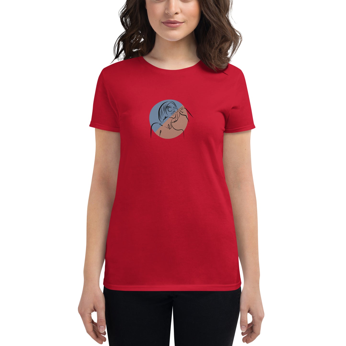 Woman wearing a true red fitted tee with an abstract face design, showcasing artistic and comfortable fashion by BYOL.