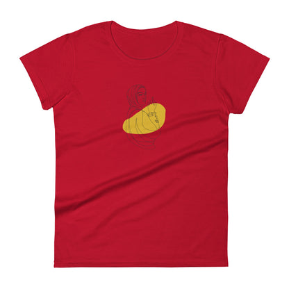 Woman wearing a true red red fitted tee with an empowered silhouette design in yellow, showcasing subtle yet impactful self-expression by BYOL.