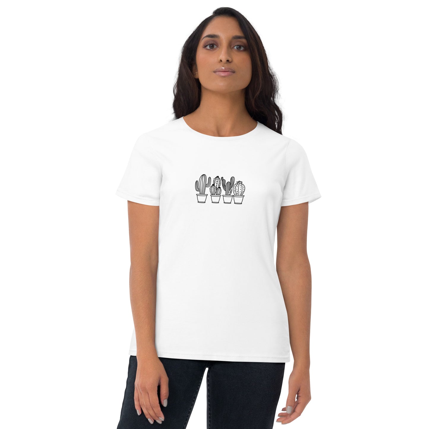 Woman wearing a white fitted tee with a cactus line art design, showcasing minimalistic and comfortable fashion by BYOL.