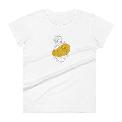 Woman wearing a white fitted tee with an empowered silhouette design in yellow, showcasing subtle yet impactful self-expression by BYOL.