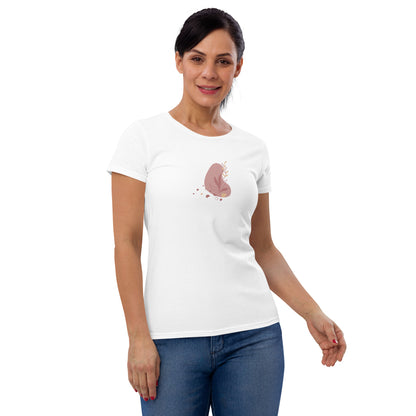 Woman wearing a white fitted tee with a soft bloom design, reflecting a blend of comfort and subtle elegance by BYOL.