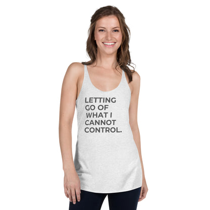 Smiling woman in a heather white racer back tank with "Letting Go of What I Cannot Control" text.