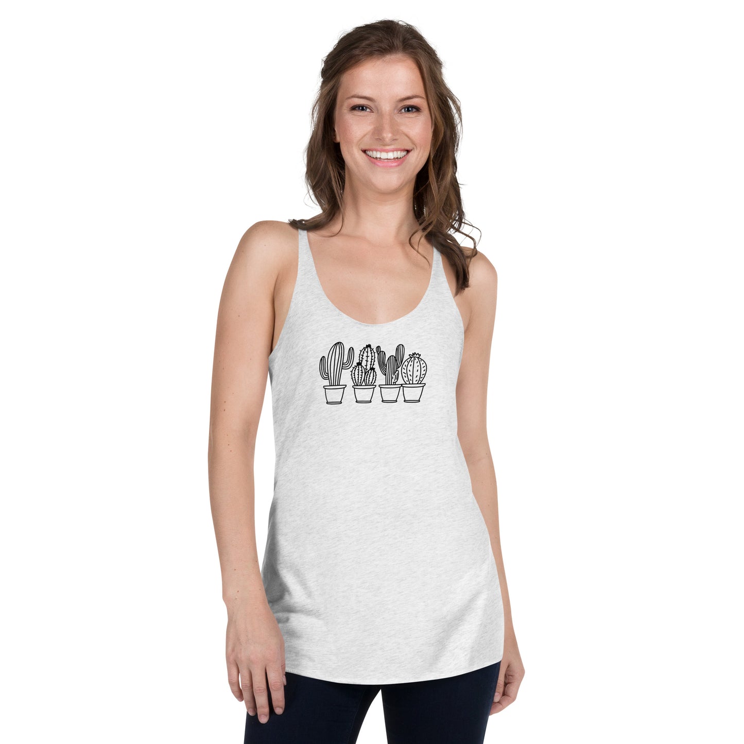 Woman wearing a heather white racer back tank top with a subtle cactus design.