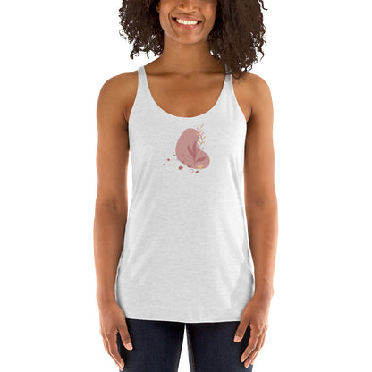 Woman wearing a heather white racer back tank top with a subtle heart-shaped leaf design. 