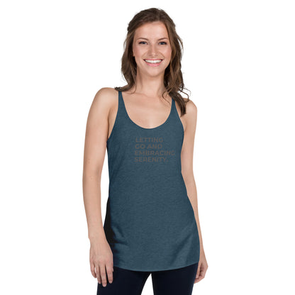 Woman in a black indigo back tank with "Letting Go and Embracing Serenity" text.