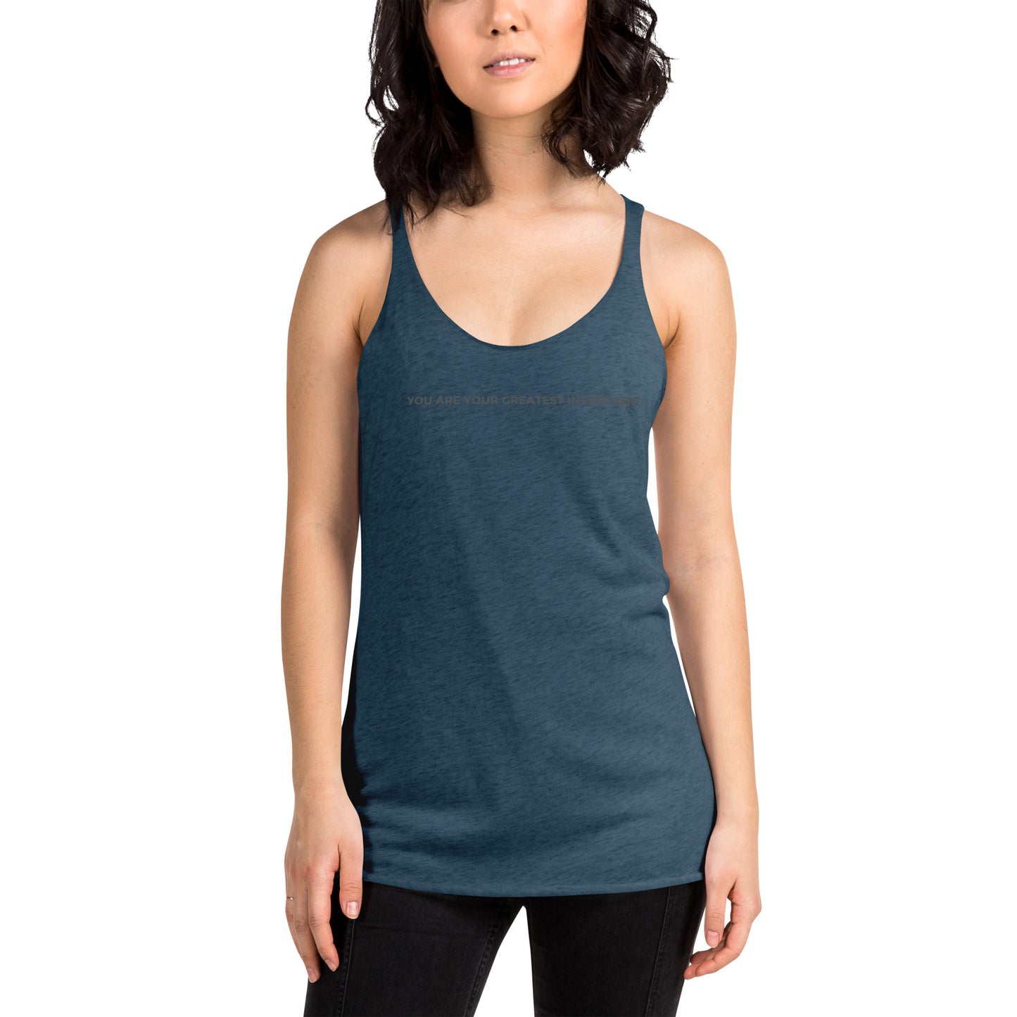 Woman wearing a indigo racer back tank with "You Are Your Greatest Investment" text.