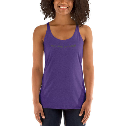 Smiling woman wearing a purple rush racer back tank with "You Are Enough" text.