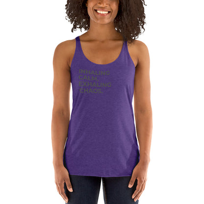 Smiling woman in a purple rush racer back tank with "Inhaling Calm, Exhaling Chaos" text.