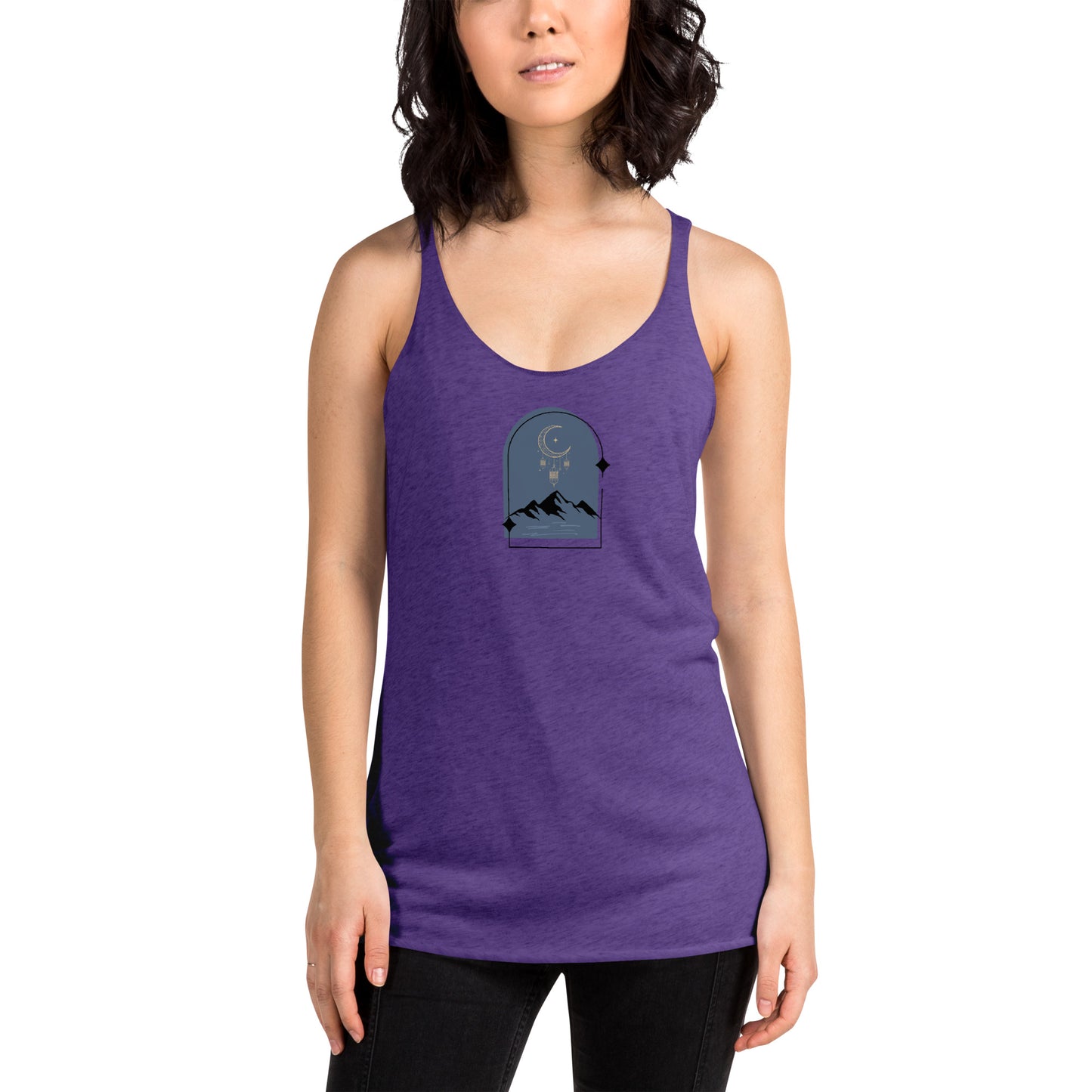 Woman wearing a heather purple racer back tank top with a subtle design of a crescent moon over mountains.