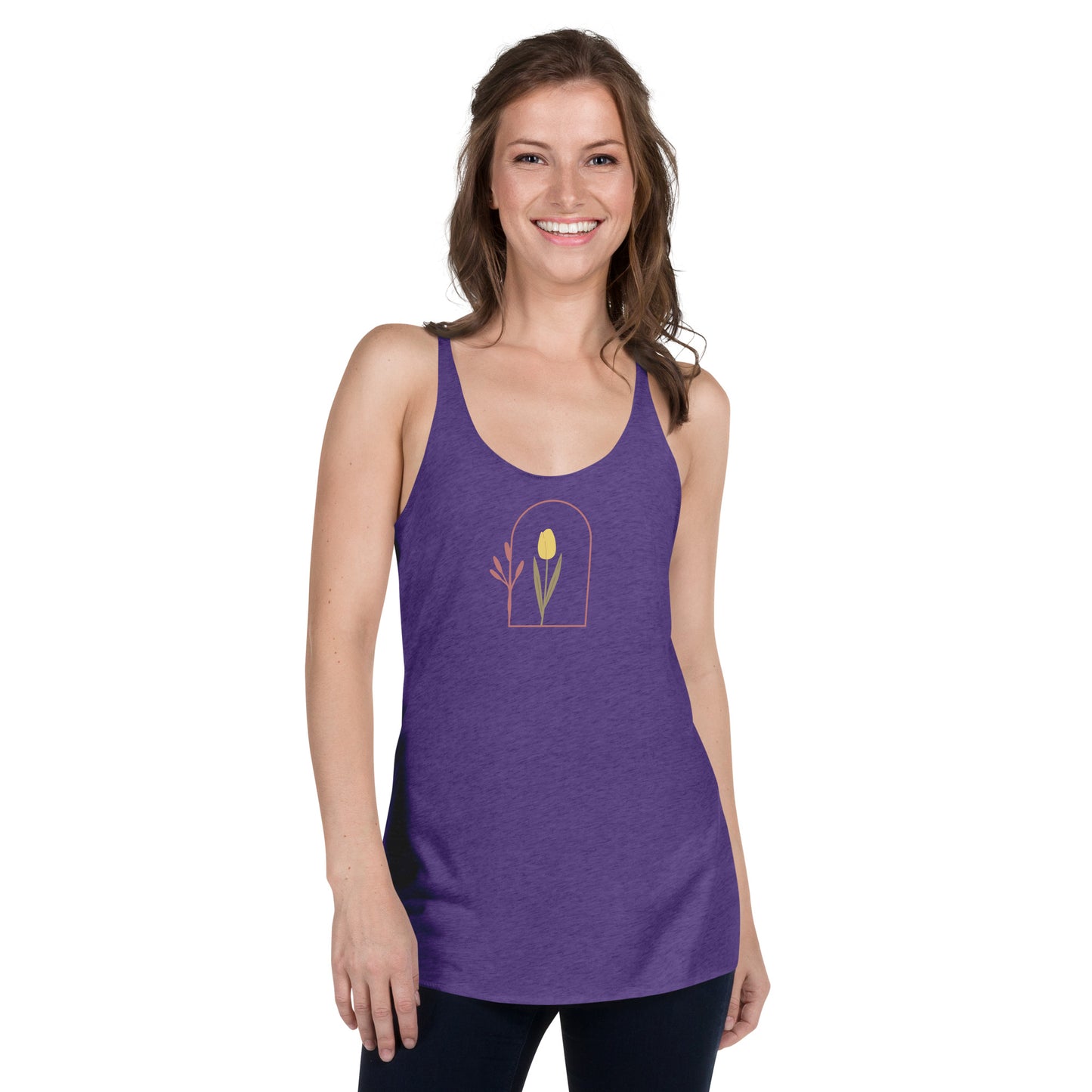 Woman wearing a heather purple racer back tank top with a subtle single flower design.