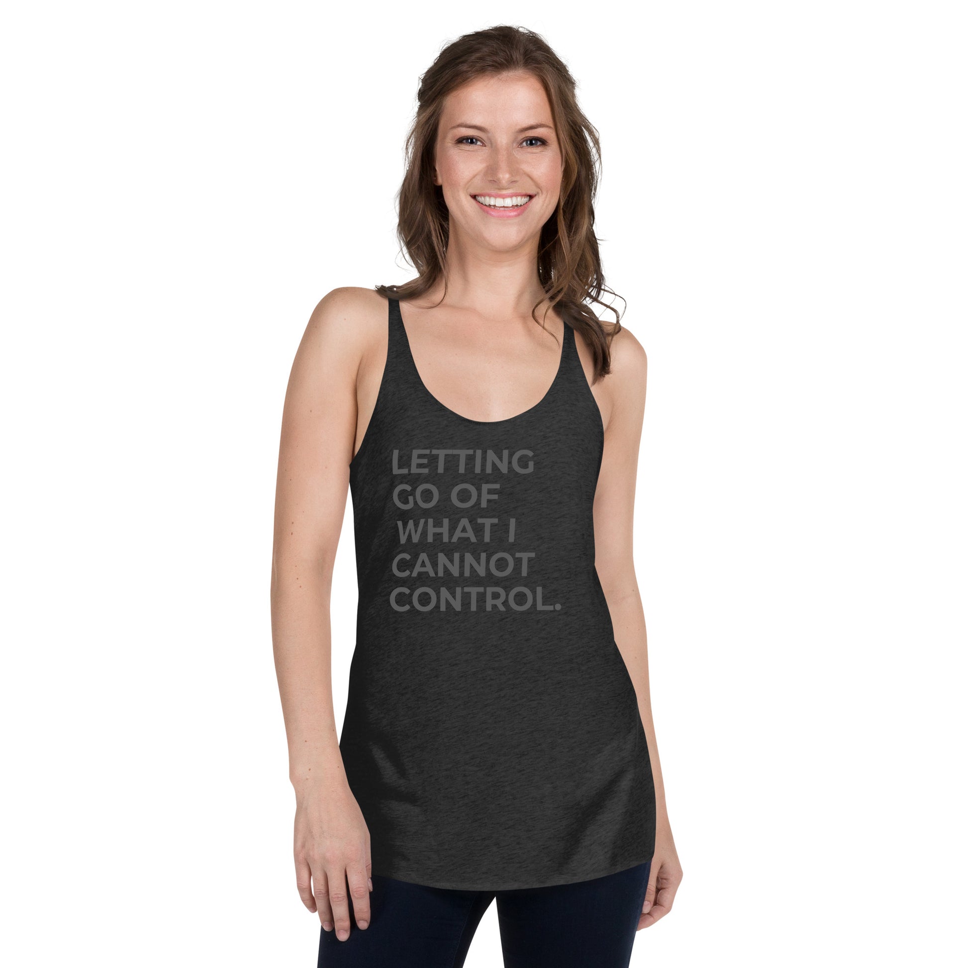 Smiling woman in a heather dark grey racer back tank with "Letting Go of What I Cannot Control" text.