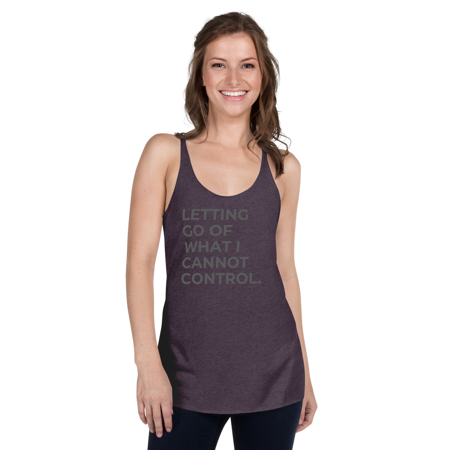 Smiling woman in a purple rush racer back tank with "Letting Go of What I Cannot Control" text.