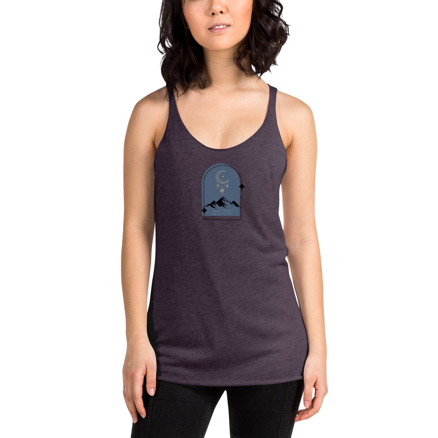 Woman wearing a heather purple racer back tank top with a subtle design of a crescent moon over mountains.