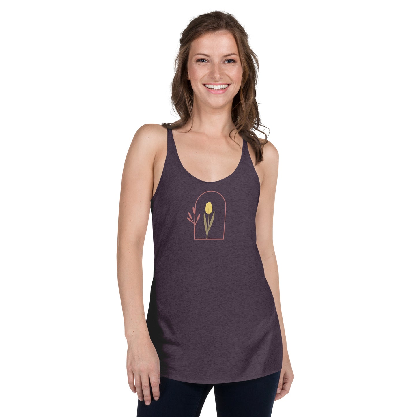 Woman wearing a heather purple racer back tank top with a subtle single flower design.