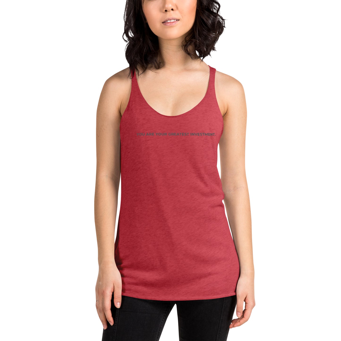 Woman wearing a vintage red racer back tank with "You Are Your Greatest Investment" text.