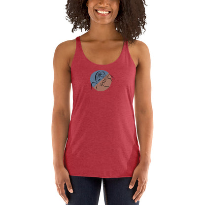 Woman wearing a heather purple racer back tank top with a subtle design of a person gazing at the moon.