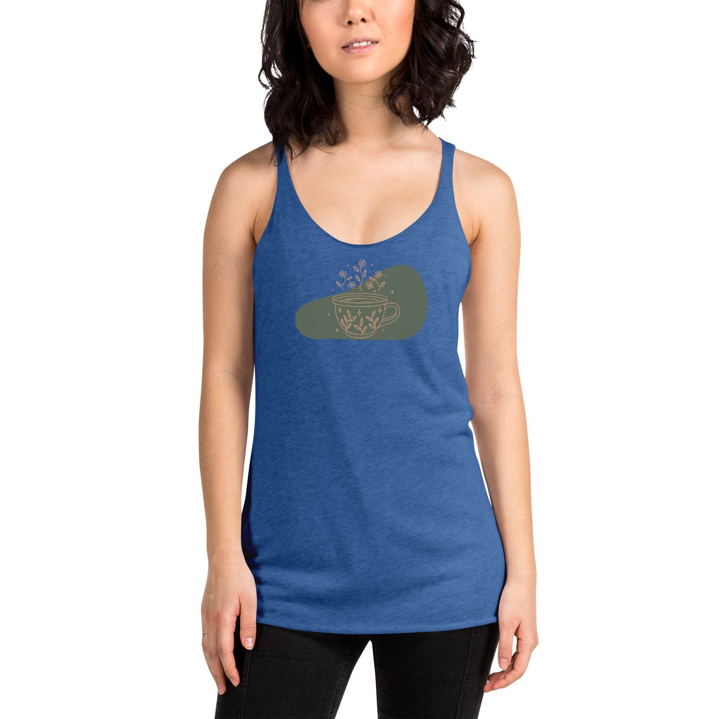 Woman wearing a heather blue racer back tank top with a muted coffee cup and floral design.