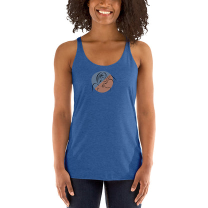 Woman wearing a heather blue racer back tank top with a subtle design of a person gazing at the moon.