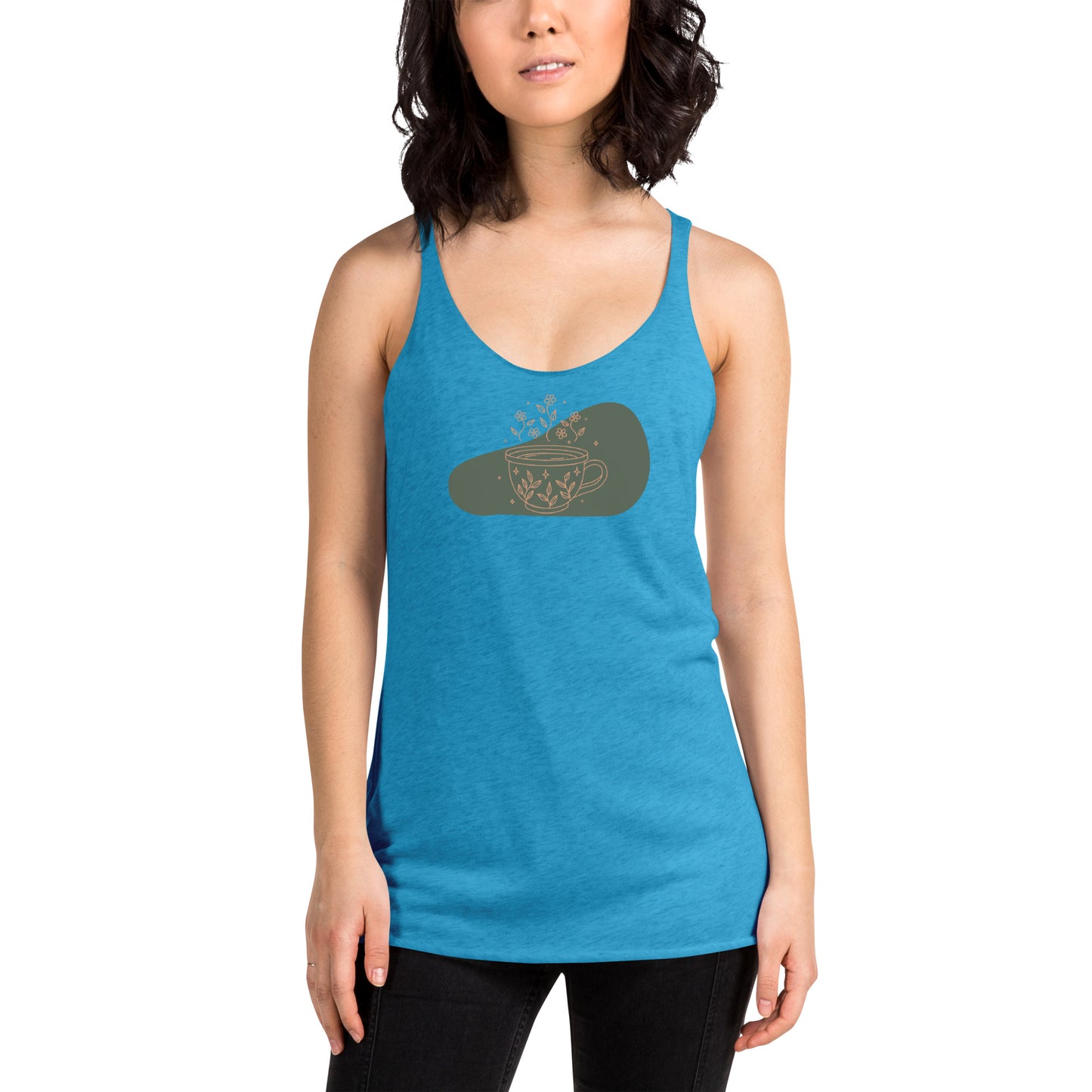 Woman wearing a heather turquoise racer back tank top with a muted coffee cup and floral design.