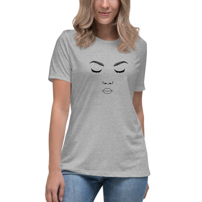 Woman wearing a heather athletic grey relaxed t-shirt featuring a minimalist face design