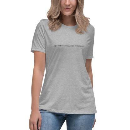 Woman wearing a athletic grey relaxed tee with "You Are Your Greatest Investment" printed.