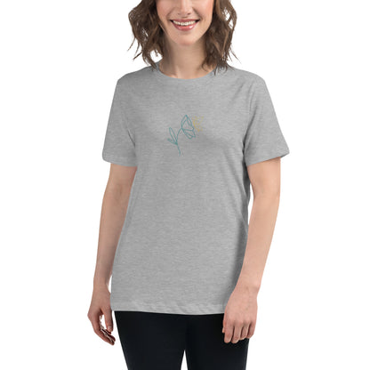 Woman wearing a heather athletic relaxed tee with a minimalist flower graphic design, embodying comfortable and authentic fashion by BYOL.