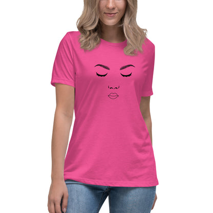 Woman wearing a pink relaxed t-shirt featuring a minimalist face design